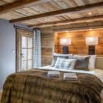 A bedroom inside our luxury catered ski chalet