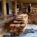 Piles of old wood planking for the interior
