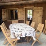 outdoor dining table at la grange au merle by clarian chalets