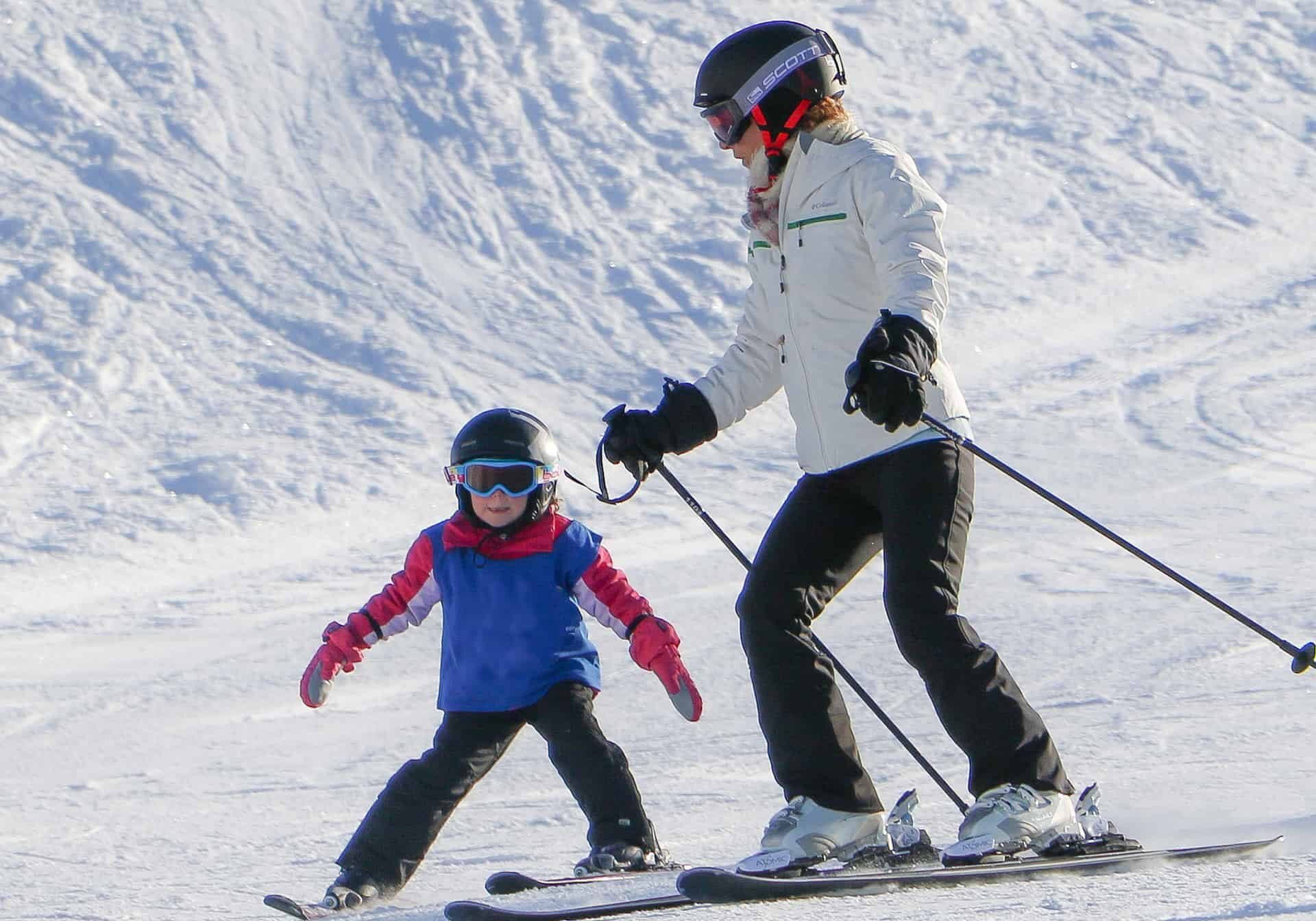 mother and child skiing